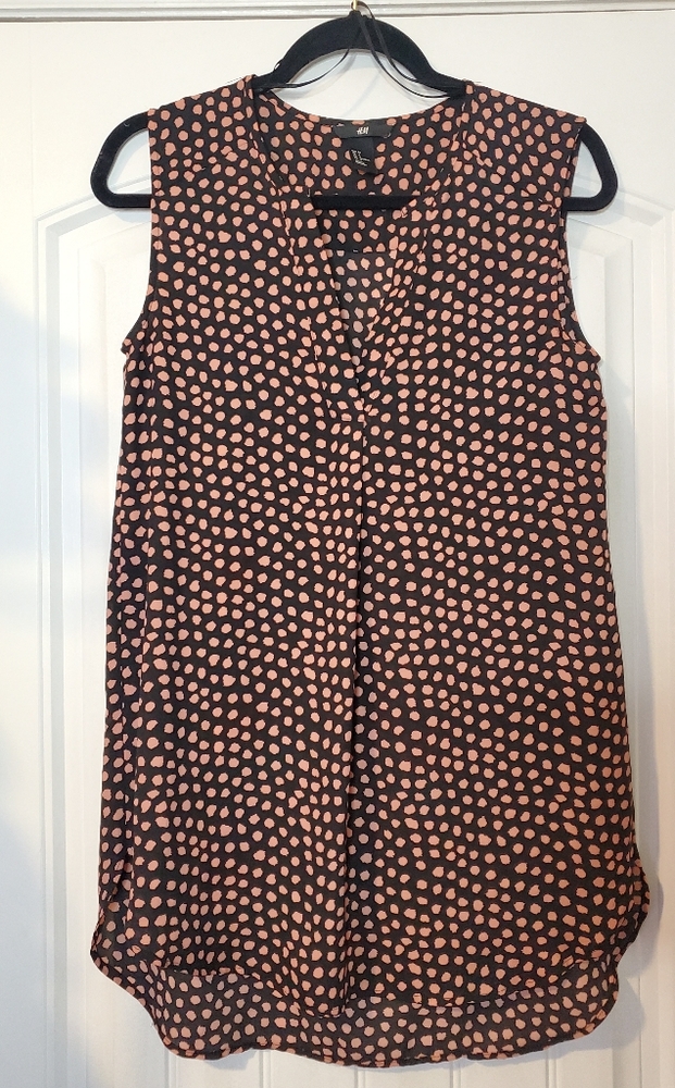 SLEEVELESS TUNIC